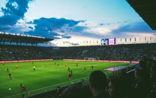 people watching soccer arena