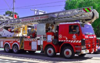 a red fire truck parked on the side of the road