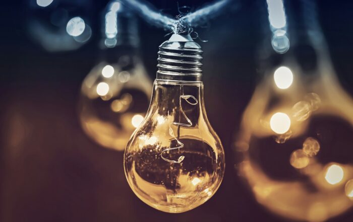 selective focus photography of light bulb